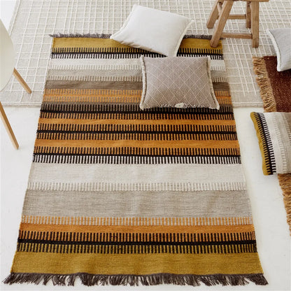 mis en situation Tapis outdoor Muturi Designers Guild motif géométrique recyclé natural 